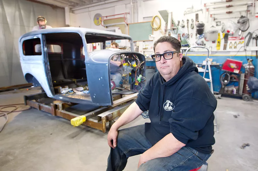 STAYING LOCAL Jason Pall, owner of Auto Body Builders, is fighting to keep his business afloat in Morro Bay. - PHOTO BY JAYSON MELLOM