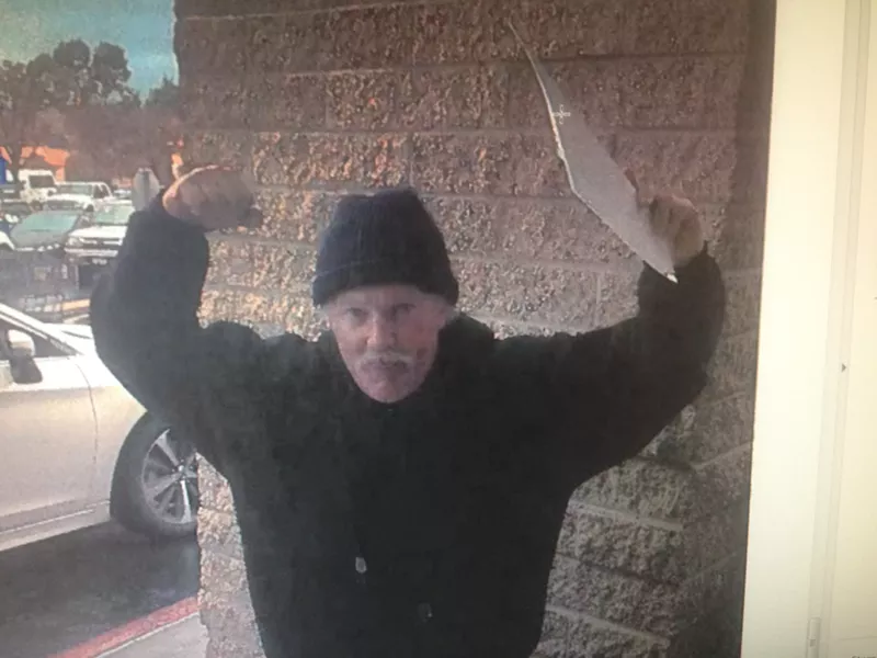PESKY PETITIONERS Albertson's says that several unarmed individuals, including the man above, are violating the company's solicitation policies and seeking signatures for petitioning outside their Paso Robles, creating a nuisance for customers. - PHOTO FROM COURT DOCUMENTS