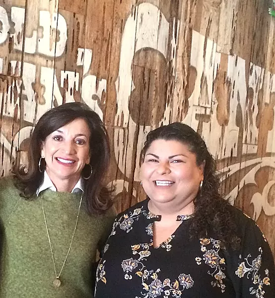 FOR THE CHILDREN Old Juan's Cantina co-owner Eva Verdin (right) presented Jack's Helping Hand co-founder Bridget Ready (left) a check for $5,000 to support a universally accessible children's playground. - PHOTO COURTESY OF OLD JUAN'S CANTINA