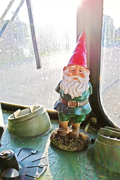 PROTECTOR OF GREENS Garden gnomes keep a watchful eye on SLO County's first ever "mobile micro farm." - PHOTO BY HAYLEY THOMAS CAIN