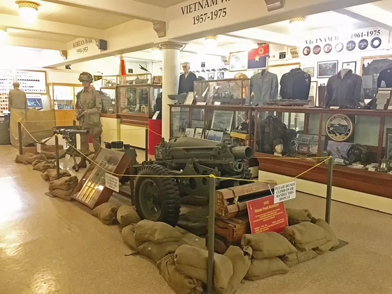 REMEMBERING THOSE BEFORE US Volunteers at the veterans museum take attendees on a story-filled tour from World War l to the present. - PHOTO BY KAREN GARCIA
