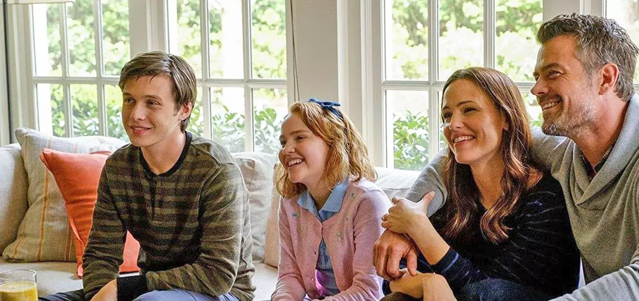 FAMILY BONDS Despite a warm and loving family, Simon (Nick Robinson, left) is still afraid to come out as gay to his little sister Nora (Talitha Bateman) and his parents Emily (Jennifer Garner) and Jack (Josh Duhamel). - PHOTO COURTESY OF FOX 2000 PICTURES