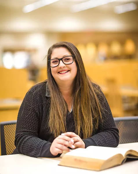 SECOND CHANCE With the help of volunteers, social workers, and social services, foster youth Amber Davis found a permanent home and a new future. - PHOTO BY JAYSON MELLOM