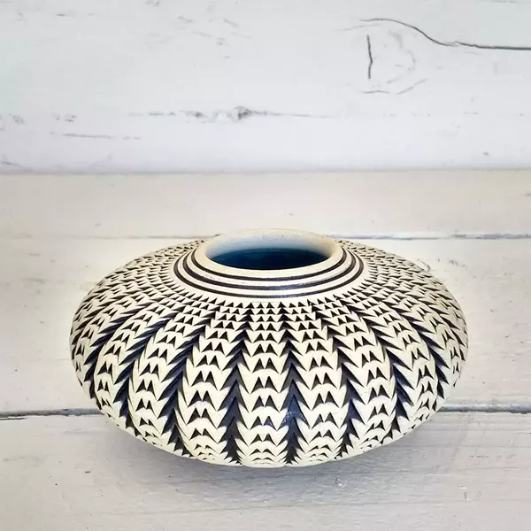 GEOMETRIC For inspiration for pieces like Squash Vessel, Standhardt often looks to spectral geometry and patterns found in nature, like in the succulent plants in his yard. - PHOTO COURTESY OF KENNY STANDHARDT