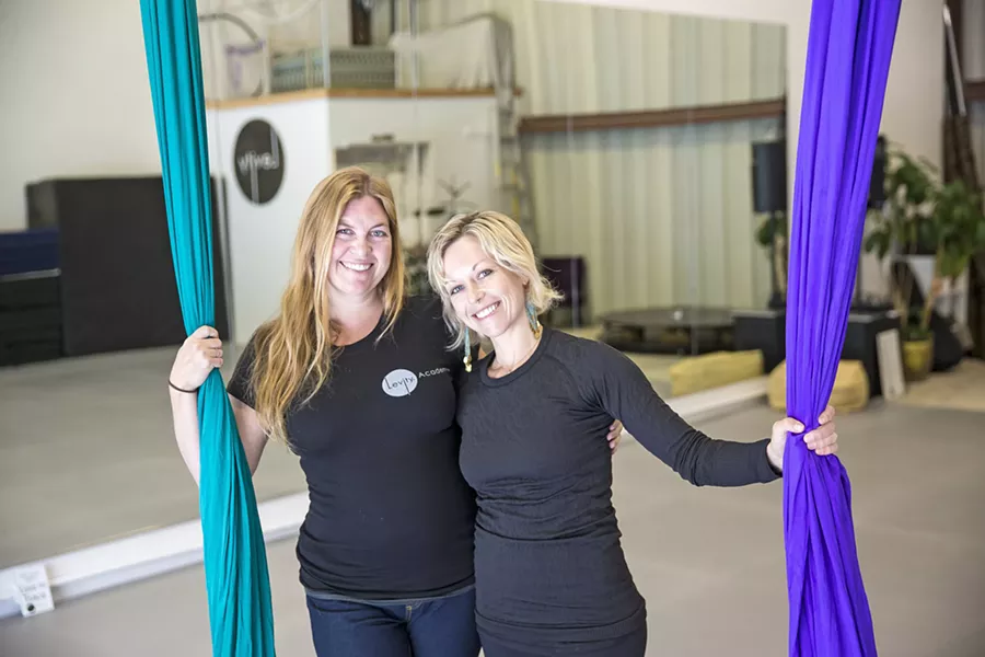 SOMETHING NEW In April, Gigi Penton (left) and Lei Lei de Kirby (right), friends and new co-owners, began to transition Suspended Motion Aerial Arts to the new Levity Academy in a space on Suburban Road in SLO. - PHOTO BY JAYSON MELLON