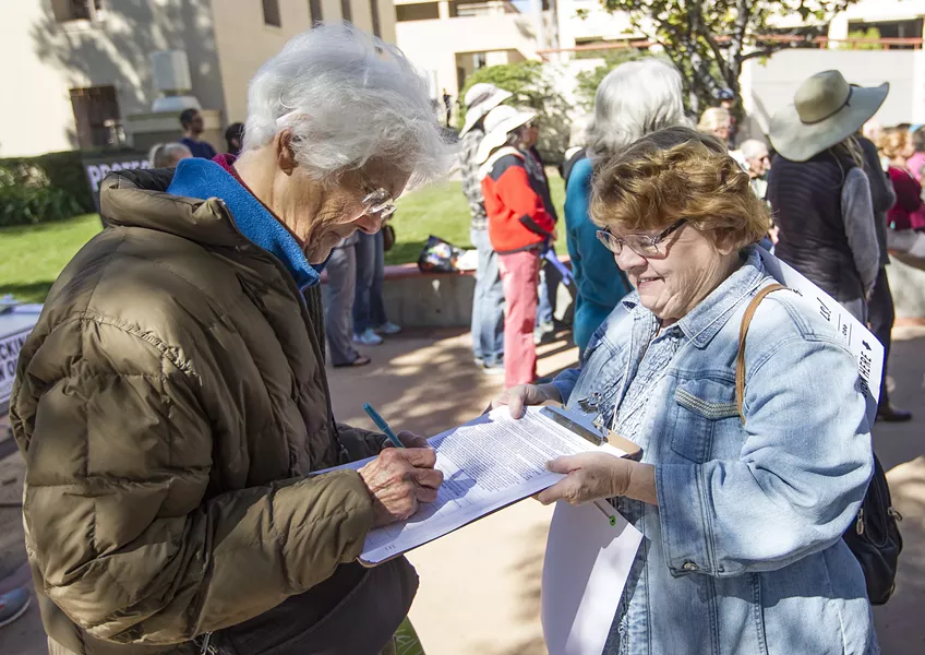 FIGHT FOR TOMORROW Volunteers with the Coalition to Protect SLO County gathered more than 20,000 signatures to qualify Measure G, a ban on fracking and new oil wells, for the November ballot. - PHOTO BY JAYSON MELLOM