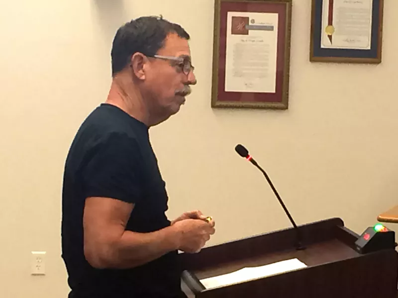 MAKING A CASE Arroyo Grande is moving forward with plans to disband three citizen advisory commissions. Arroyo Grande Historical Commission Chairman Bill Hart (above) argued against the decision at an Aug. 14 meeting. - PHOTO BY CHRIS MCGUINNESS