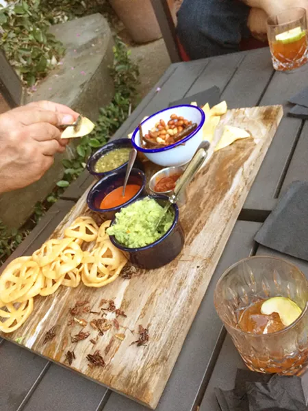 STARTERS Chips, guac, and crickets were our chef's table appetizers at The Bear and Star restaurant in Los Olivos. - PHOTO BY CHRIS MCGUINNESS