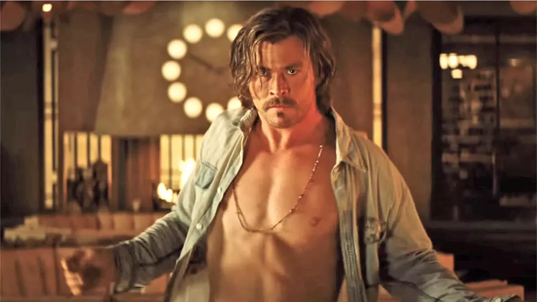 DARK CHARISMA Chris Hemsworth stars as Charles Manson-like cult leader Billy Lee, who rains down holy hell on the El Royale hotel. - PHOTOS COURTESY OF TWENTIETH CENTURY FOX