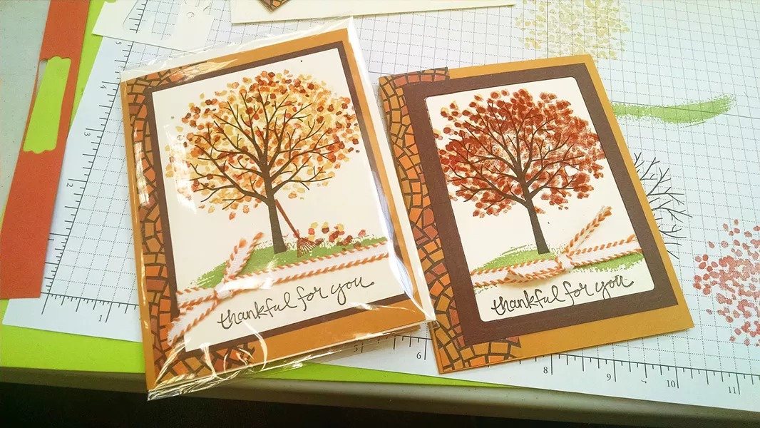 EXPECTATIONS VS. REALITY My Thanksgiving card (right) came out almost identical to the example card (left) we were given, minus a rake and some leaves. - PHOTO BY CALEB WISEBLOOD