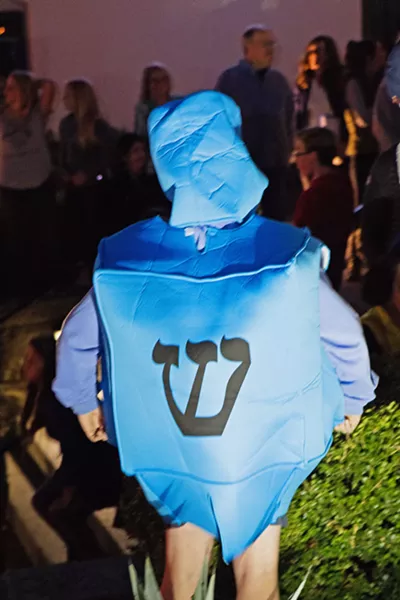 DREIDEL CHILD A child wears a dreidel costume at last year's Hanukkah Downtown at Mission SLO. - PHOTOS COURTESY OF THE JCC OF SLO