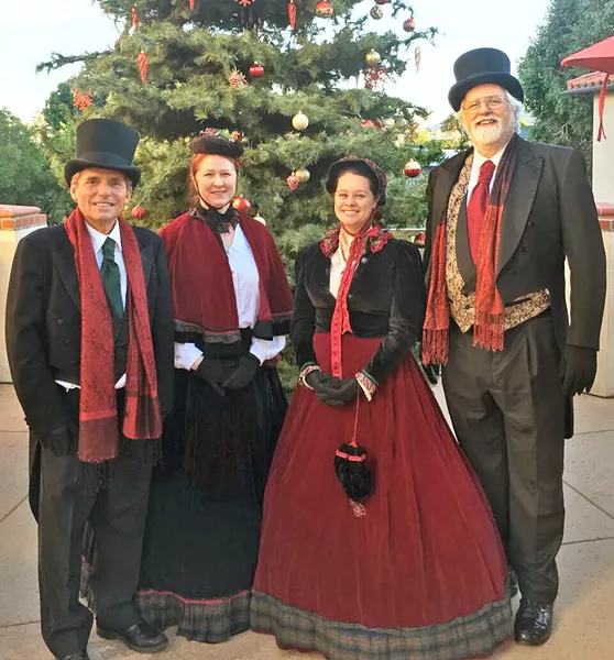 VICTORIAN MOTIF! The Uncommonne Carolers, (left to right) Craig Updegrove, Karla Santare, Meagan Glimpse, and Chuck Hiigel, perform everything from church hymns to modern popular holiday songs arranged both simply and in more complicated jazz and classical styles. - PHOTO COURTESY OF LINDA A. WILSON