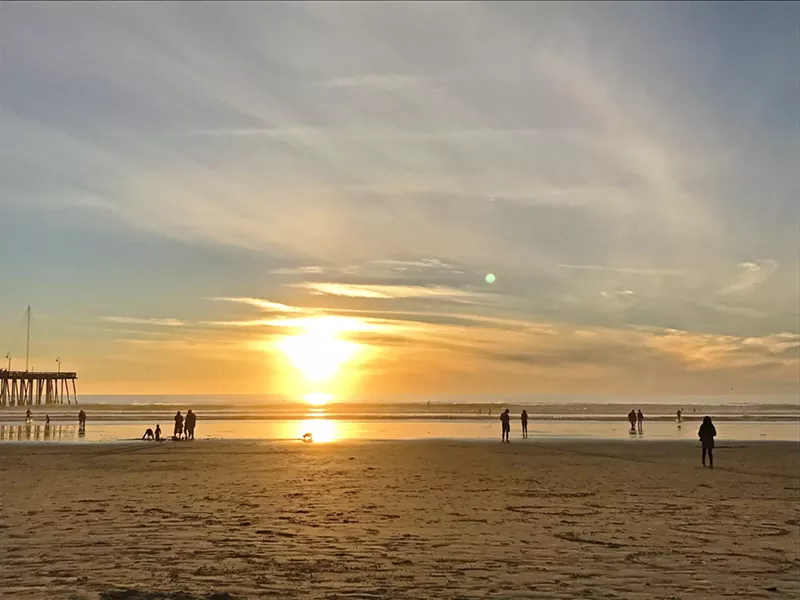 GOLDEN HOUR There's nowhere else I can feel so simultaneously at peace and inspired than on the Pacific Ocean shore. Here's Pismo Beach at sunset, after a long walk down the coast. - PHOTO BY PETER JOHNSON