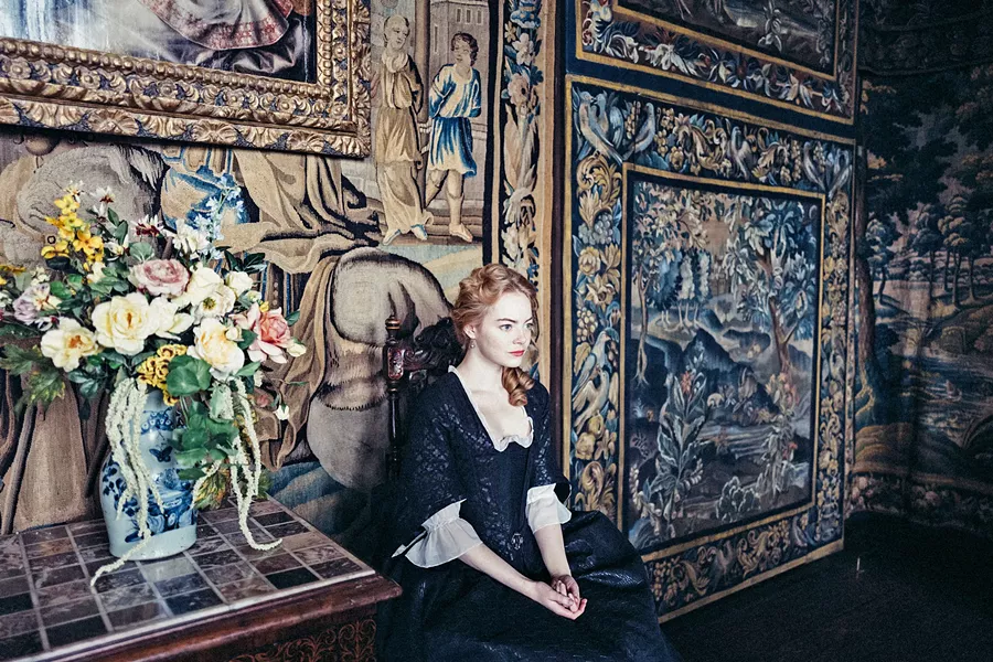 SYCOPHANT Abigail (Emma Stone), a new servant to Queen Anne, connives herself into a position of power, in The Favourite. - PHOTO COURTESY OF ELEMENT PICTURES