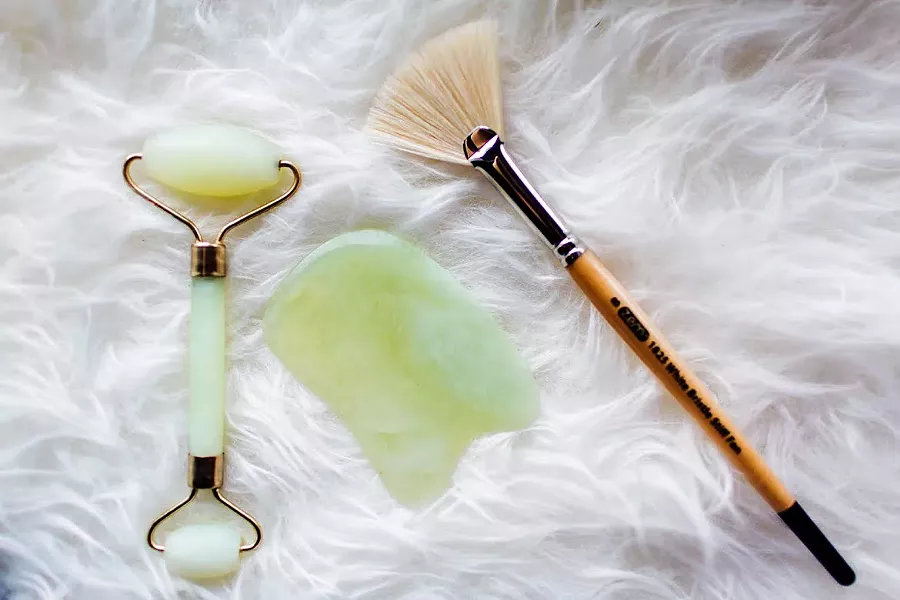 RELAXATION In addition to her all-natural and CBD products, Blanco uses a jade roller and Gua Sha tools to further enhance the oils and creams applied to the face. - PHOTOS COURTESY OF ASIA CROSON PHOTOGRAPHY