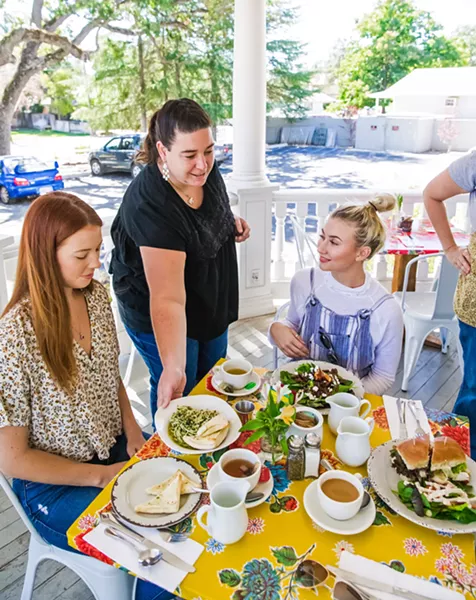 SERVICE EXPERIENCE Leslie Madruga (center left) serves lunch to customers at Fig at Courtney's House. The nonprofit restaurant in Templeton provides job training, employment, and community to adults with disabilities. - PHOTO BY JAYSON MELLOM
