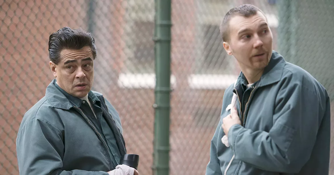 DESPERADOS Richard Matt (Benicio Del Toro, left) and David Sweat (Paul Dano, right) conspire to escape from a maximum security prison with help from their lover, Tilly Mitchell, a civilian who runs the prison's sewing shop. - PHOTO COURTESY OF RED HOUR FILMS