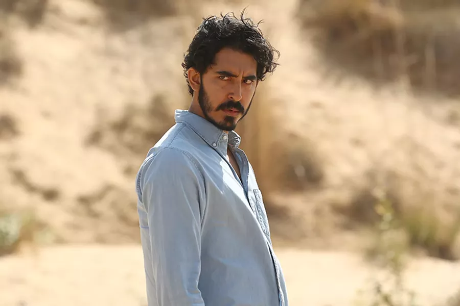 MAN ON A MISSION Dev Patel stars as Jay, a mysterious British Muslim man journeying across Pakistan and India, in writer-director Michael Winterbottom's The Wedding Guest, screening exclusively at The Palm. - PHOTO COURTESY OF INDIA TAKE ONE PRODUCTIONS