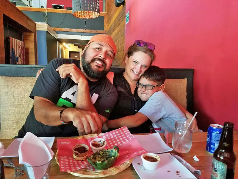 KEEPING IT TOGETHER Cortney Upthegrove is working to hold her family together after her husband, Juan Murguia, was sent back to the Mexico because of his undocumented status. - PHOTO COURTESY OF CORTNEY UPTHEGROVE