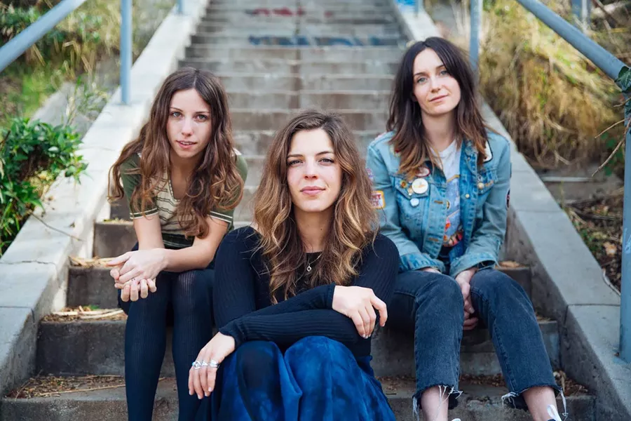 GET WILD The Wild Reeds—Kinsey Lee, Mackenzie Howe, and Sharon Silva—bring their harmony vocals to SLO Brew Rock on May 8, in support of their third album, Cheers. - PHOTO COURTESY OF THE WILD REEDS