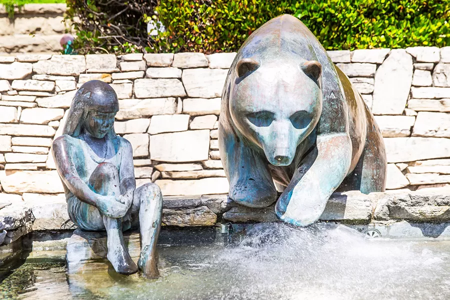 PUBLIC ART Paula Zima, the artist behind Mission Plaza's bear and child sculpture, is the sculptor for a proposed monument of former President Teddy Roosevelt. Objections from local indigenous groups and others have put the project on hold. - PHOTO BY JAYSON MELLOM