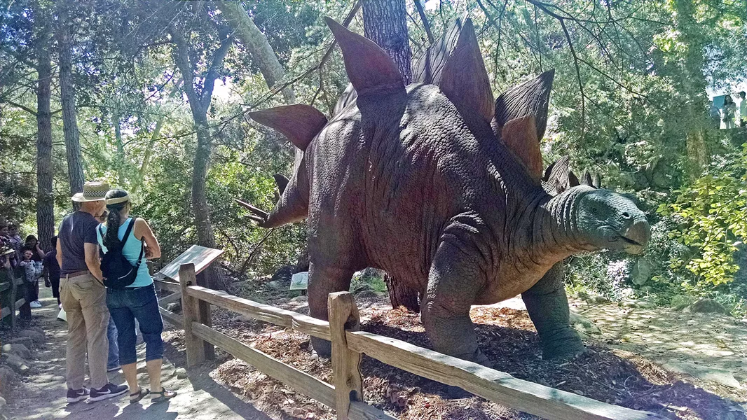 L'EGGO MY STEGO The Prehistoric Forest exhibit features several herbivores, including the stegosaurus. - PHOTO BY CALEB WISEBLOOD