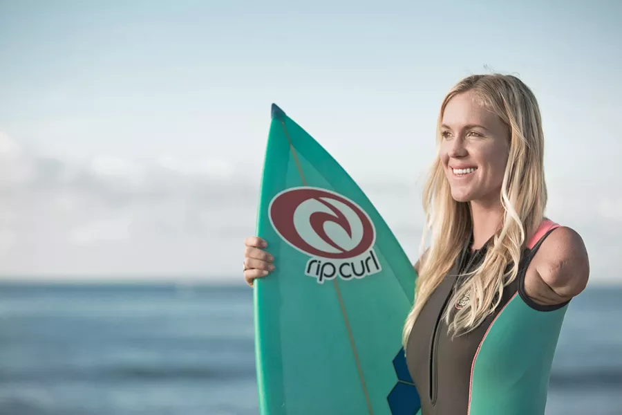 DETERMINATION Bethany Hamilton may have lost her arm to a tiger shark attack, but that didn't stop her from becoming a pro surfer, chronicled in the new documentary Bethany Hamilton: Unstoppable, screening exclusively at The Palm Theatre. - PHOTO COURTESY OF AARON LIEBER