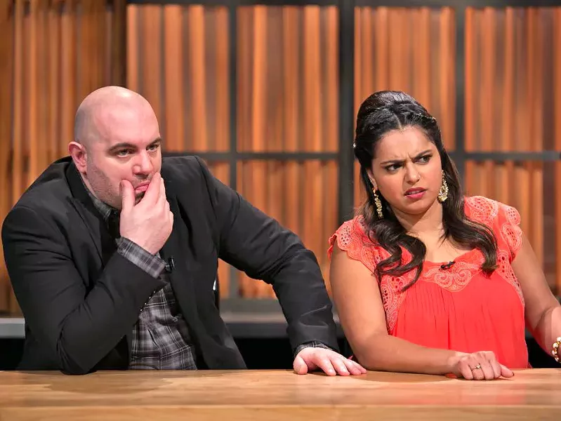 CAN'T LOOK AWAY Recurring Chopped judges Chris Santos (left) and Maneet Chauhan (right) watch in horrified agony as competitors make insane decisions, which is pretty much how I feel sometimes when watching the show. - PHOTO COURTESY OF FOOD NETWORK