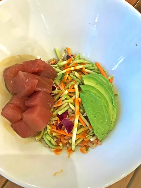 POKE NATURALS This dish must be considered a health food. Brown rice and cabbage slaw. Chunks of fresh ahi on top of all the fixins. Yep, it's Superfood. - PHOTOS BY BETH GIUFFRE