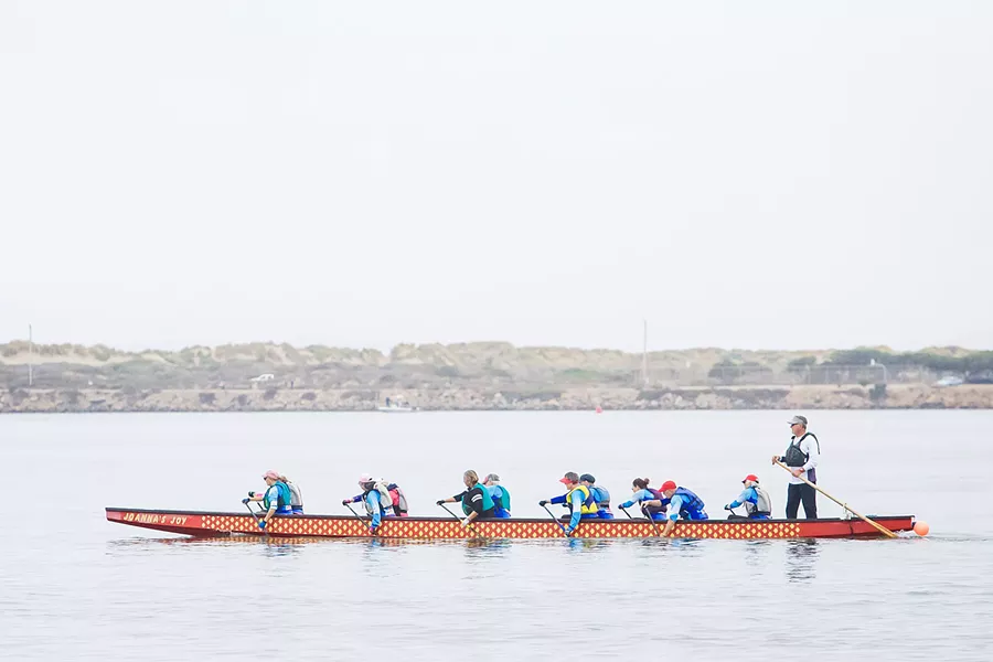 IN THE SAME BOAT The Central Coast Dragon Boating Association offers several boat trainings and activities each week in Morro Bay, for a range of skill levels. The nonprofit was founded in 2007 by a group of breast cancer survivors, and it's grown to more than 100 members today. - PHOTOS BY JAYSON MELLOM