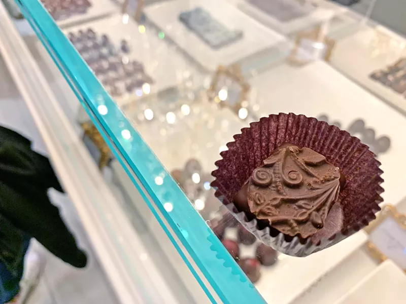 SWEET TREATS Sheila Kearns Chocolate & Confections was sampling their milk, dark, and bourbon chocolate (pictured here) treats. - PHOTO BY CAMILLIA LANHAM