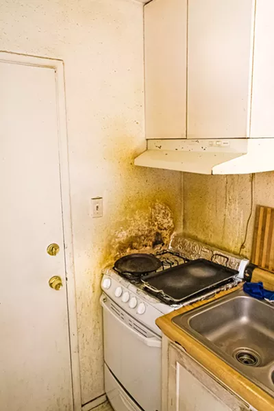 SLUM CONDITIONS The Grand View Apartment tenants sought help after living for several years with rat and vermin infestations, bed bugs, and faulty plumbing. - FILE PHOTO BY JAYSON MELLOM