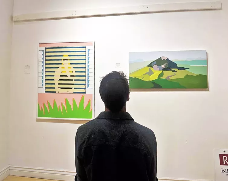 FAMILIAR SIGHTS A gallerygoer observes a featured painting that captures San Luis Obispo's iconic mountains. - PHOTOS COURTESY OF EDEL MITCHELL