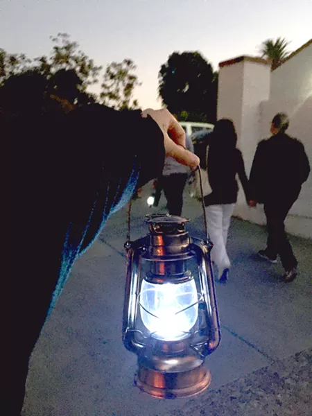 FOLLOW THE LIGHT Talking about ghosts feels even more authentic with one of these battery-powered, oil lamp lookalikes lighting your path. - PHOTOS BY KASEY BUBNASH