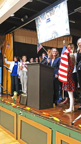STUMP SPEECH Flanked by supporters, Dawn Addis announces her candidacy for state Assembly at a SLO Progressives Club event on Nov. 7. - PHOTO BY PETER JOHNSON