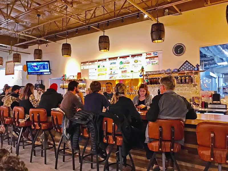 LUSH FIELDS On a recent Friday evening, Wild Fields was packed with families, couples, and a flow of customers taking bar stools to watch football and hang out. The brewhouse has only been open a month, but the word has spread far and wide. - PHOTOS BY BETH GIUFFRE