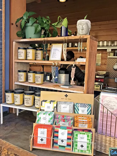 SIMPLE CUP O' JOE On the front counter, next to the coffee station that features help-yourself refills, you can take home a taste of Hidden Kitchen's curated comestibles, including Art of Tea and café co-owner Amira Albonni's very own Grateful Ghee. - PHOTO BY BETH GIUFFRE