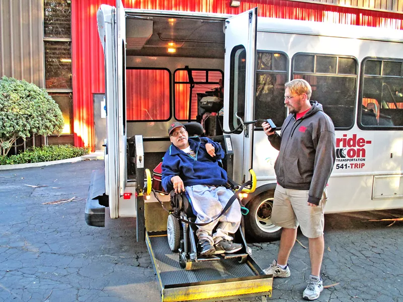TRANSPORT FOR ALL With a fleet of more than 90 vans, buses, and wheelchair-accessible vehicles, Ride-On Transportation provides roughly 299,000 rides a year and runs a number programs for low-income individuals, seniors, veterans, individuals with disabilities, and the general public. - PHOTO COURTESY OF MARK SHAFFER