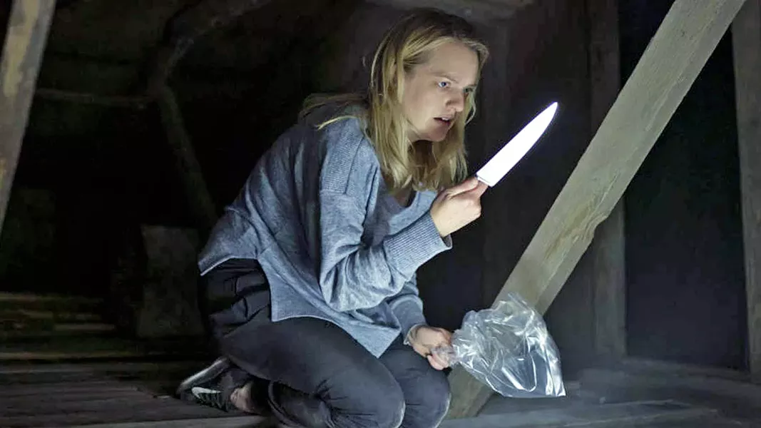 SET UP After her abusive partner stages his suicide and uses his invention of invisibility to frame her as an insane criminal, Cecilia (Elisabeth Moss) must find the strength to fight back. - PHOTOS COURTESY OF BLUMHOUSE PRODUCTIONS