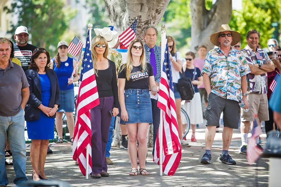 FREEDOM FIGHTERS SLO County 5th District Supervisor Debbie Arnold (left) said that residents who attended the ReOpen SLO County rally were concerned that their "constitutional freedoms are being assaulted." - PHOTOS BY JAYSON MELLOM