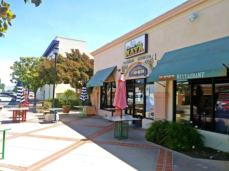 NEW PATIO Maya Mexican Restaurant in Santa Maria has taken advantage of temporary changes to city regulations that allow restaurants to set up tables and chairs on sidewalks and in parking lots. - PHOTO BY ZAC EZZONE