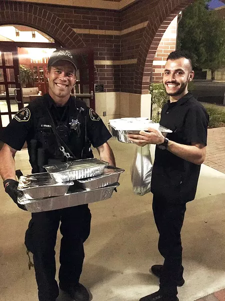A THANK YOU WITH SPECIAL SAUCE At the beginning of June, Big Bubba's Bad BBQ prepared trays of barbecue for the Paso Robles Police Department and Protect Paso civilian "protectors" to help them face the long nights ahead. - PHOTOS COURTESY OF ROGER SHARP