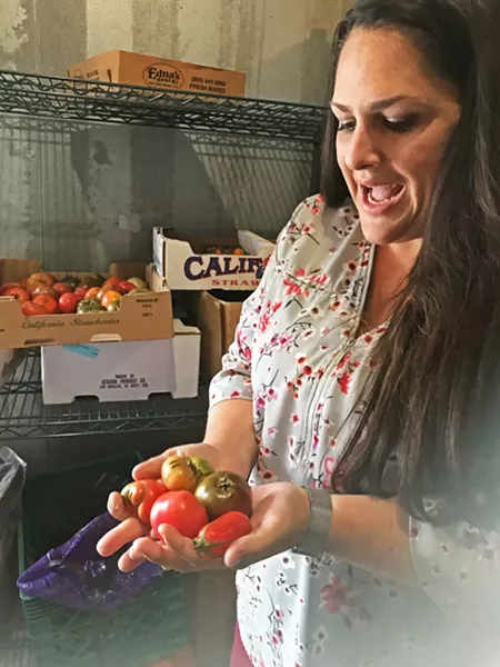 SCHOOL LUNCHES STILL INNOVATING Erin Primer, director of food services for San Luis Coastal Unified School District, found a way to feed more students during the COVID-19 shelter-at-home. Instead of students picking up just one meal at a time, she had her team prepare a week's worth of food for one pick-ups. - PHOTO BY BETH GIUFFRE