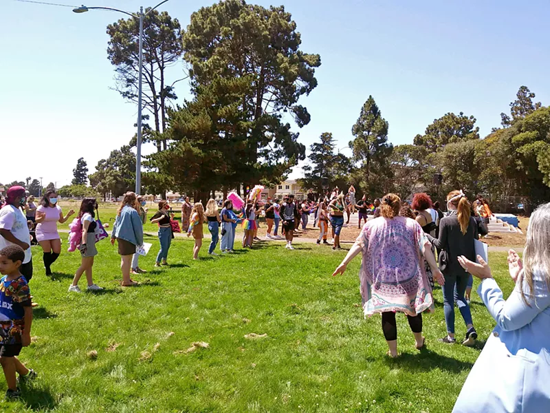 CELEBRATING PRIDE About 100 people gathered at Ryon Park in Lompoc to celebrate Pride Month and remember LGBTQ-plus community members who have been killed violently. - PHOTO BY ZAC EZZONE