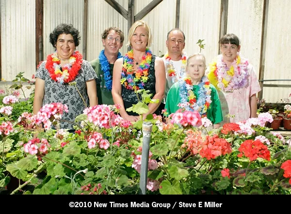 READY FOR FUN : From left to right, Tammy Ewalf, Scott Hall, Kristine Cleary, Rusty Davis, Janice Strickner, and Sandy Butler take a break from gardening to plan a tropical themed camping trip. - PHOTO BY STEVE E. MILLER