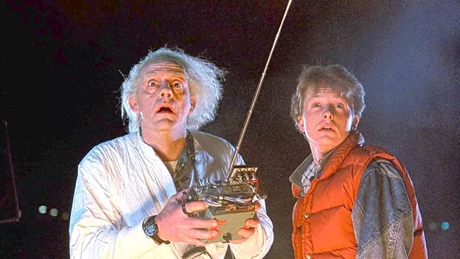 GREAT SCOTT!: Dr. Emmett Brown (Christopher Lloyd, left) and Marty McFly (Michael J. Fox) work together to send Marty 30 years in the past to make sure his parents meet in high school and fall in love, in Back to the Future. - PHOTO COURTESY OF UNIVERSAL PICTURES AND AMBLIN ENTERTAINMENT