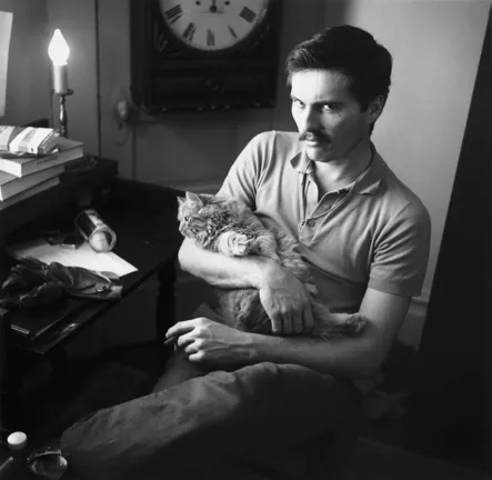 MAN AND BEAST : “He was one of my first crushes,” Tress admits of the young man pictured. The photo was taken in the Bachelor’s Quarters, a boardinghouse for men in San Francisco. - PHOTO BY ARTHUR TRESS