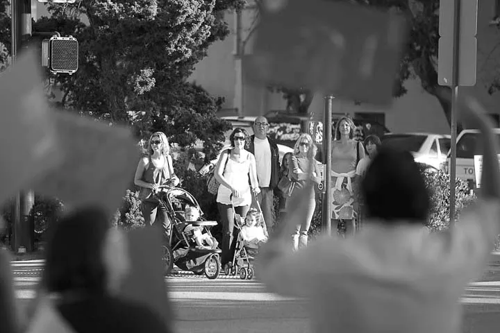 VAGUE PROTEST : The vague protest commenced on the corner of Marsh and Osos Streets, in front of the New Times office. - PHOTO BY STEVE E. MILLER