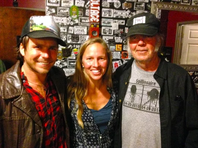 THANK YOU, GOOD MEDICINE PRESENTS!: Willie Nelson’s son Lukas Nelson (left), Good Medicine Presents co-owner Korie Newman (center), and iconic rocker Neil Young (right) joined forces to play a last minute, secret concert at SLO Brew. - PHOTO BY GLEN STARKEY