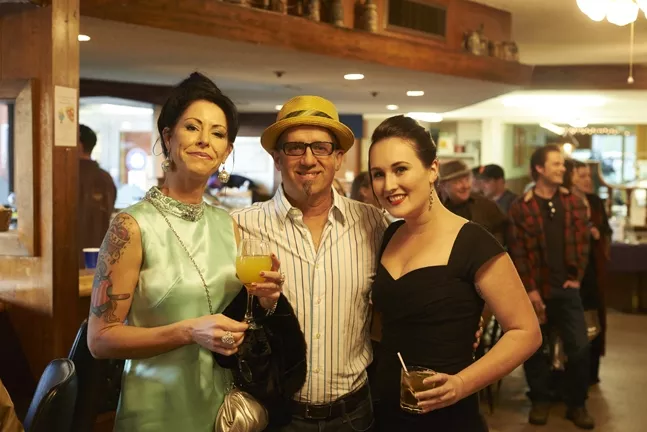 HIPSTER CITY : My Pal Mick Souza finds himself sandwiched between (I hope I have these names right, ladies) Jill (left) and Deidra. - PHOTOS BY STEVE E. MILLER
